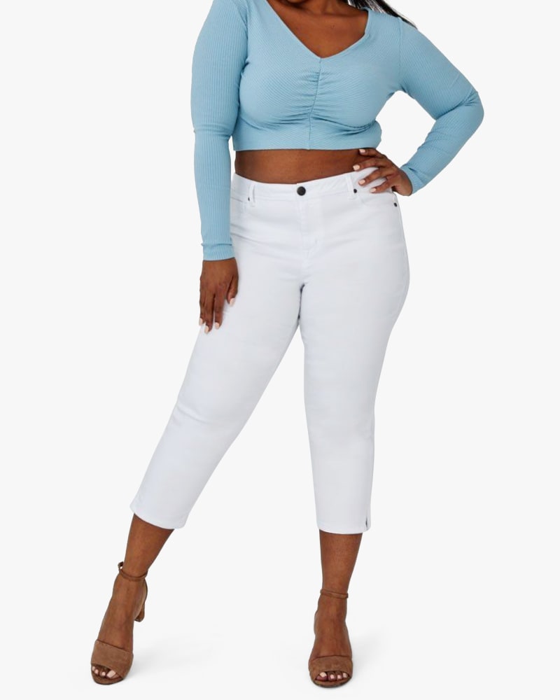 Front of a model wearing a size 14 Maggy Cropped Skinny Jean in White by 1822 Denim. | dia_product_style_image_id:154722